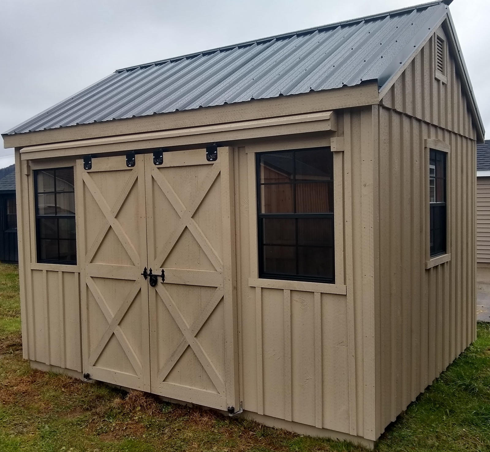 Board & Batten Shed with Sliding Doors and Metal Roof