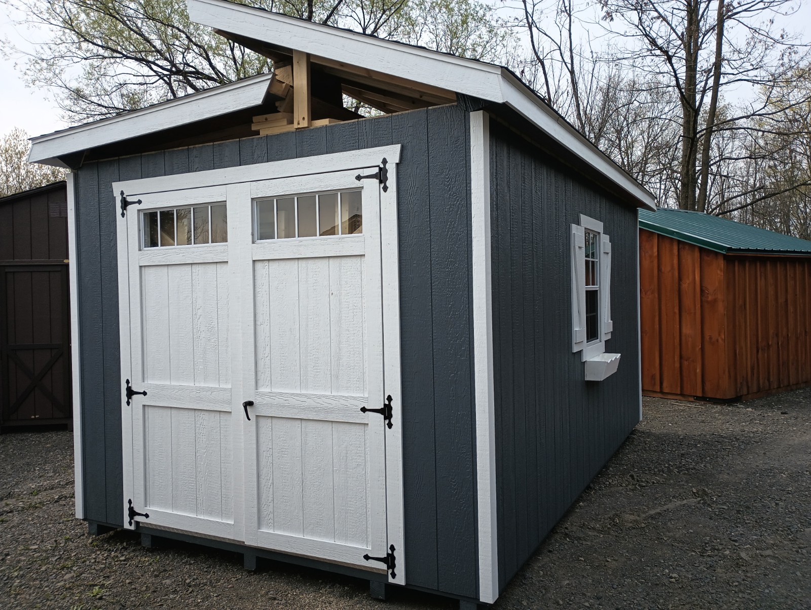 Blue Hinged Roof Shed with Double Doors and Windows