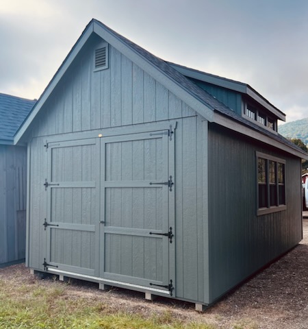 Avocado shed with large double doors and hinged roof