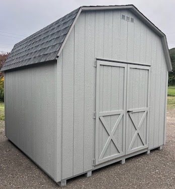Barn style shed with double doors and shingles