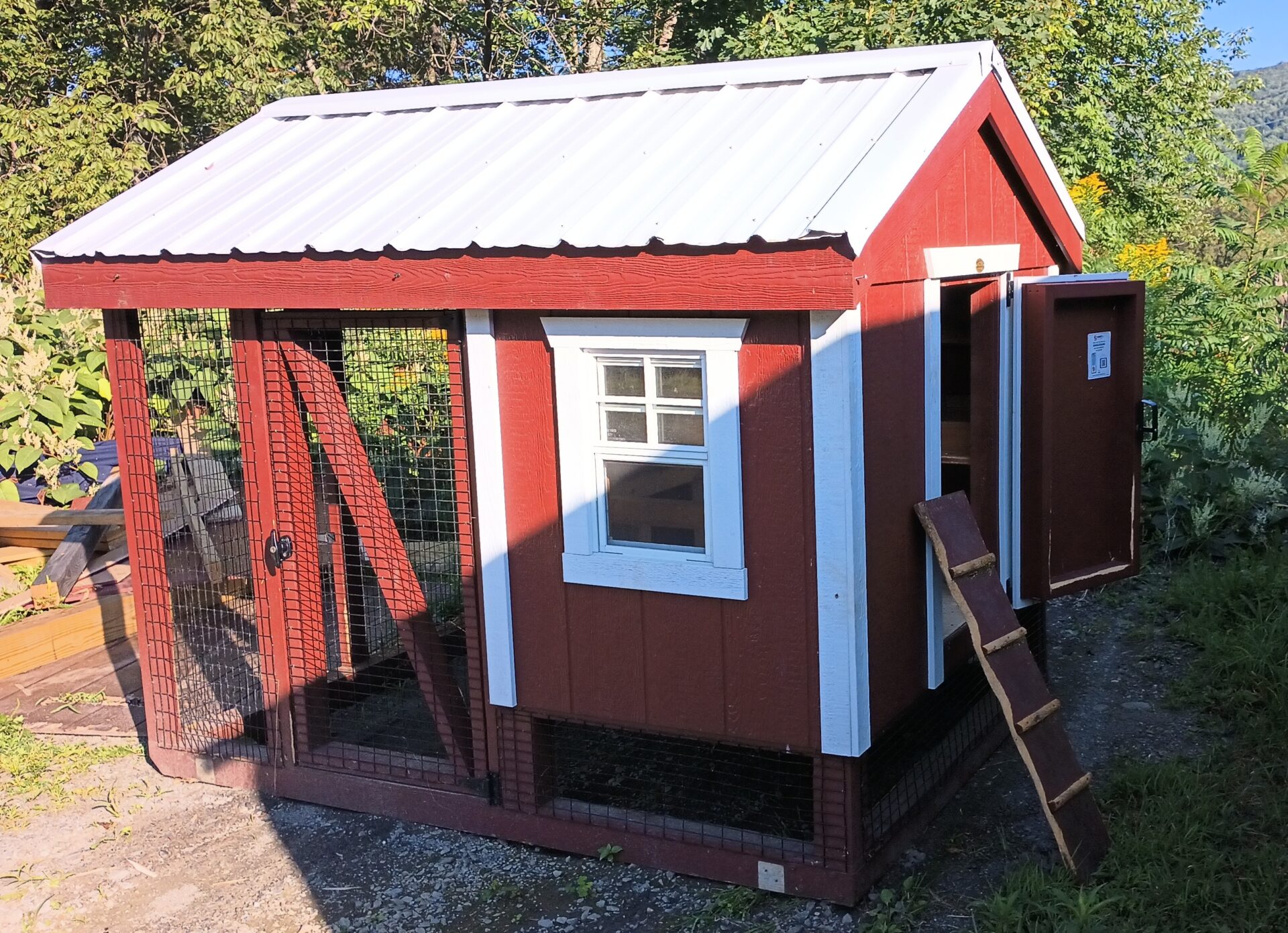 Red and white combination chicken coop