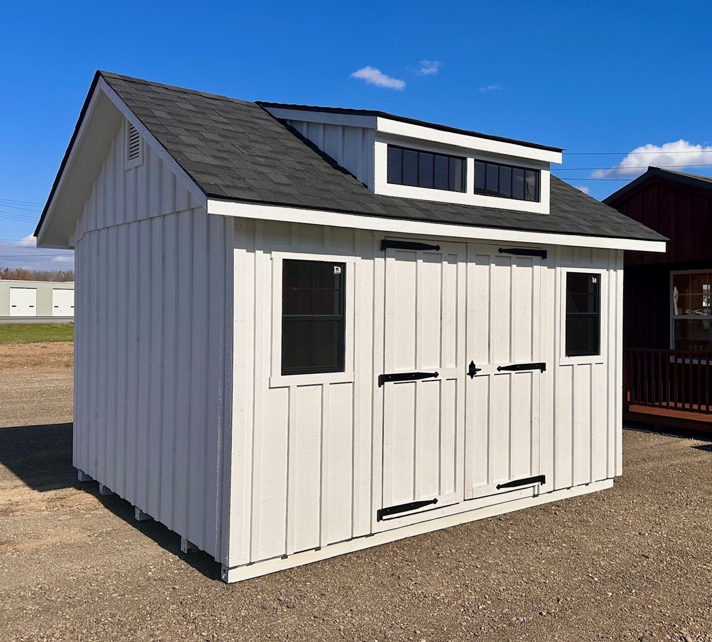 White Board & Batten Shed with Transom Dormer Doors and Windows