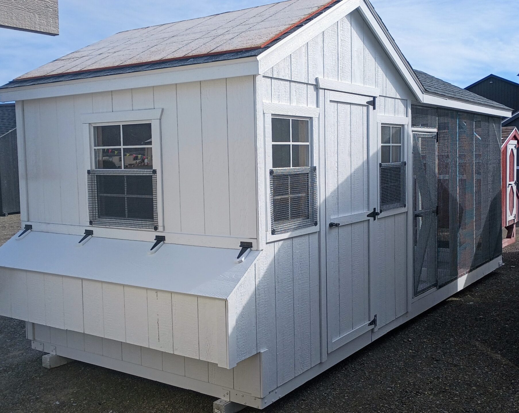 White chicken coop with run, nesting boxes, 3 windows and entry door
