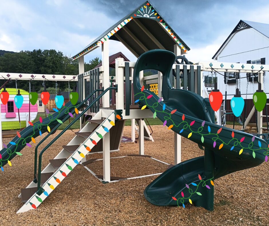 Vinyl swing set with rock wall and slides