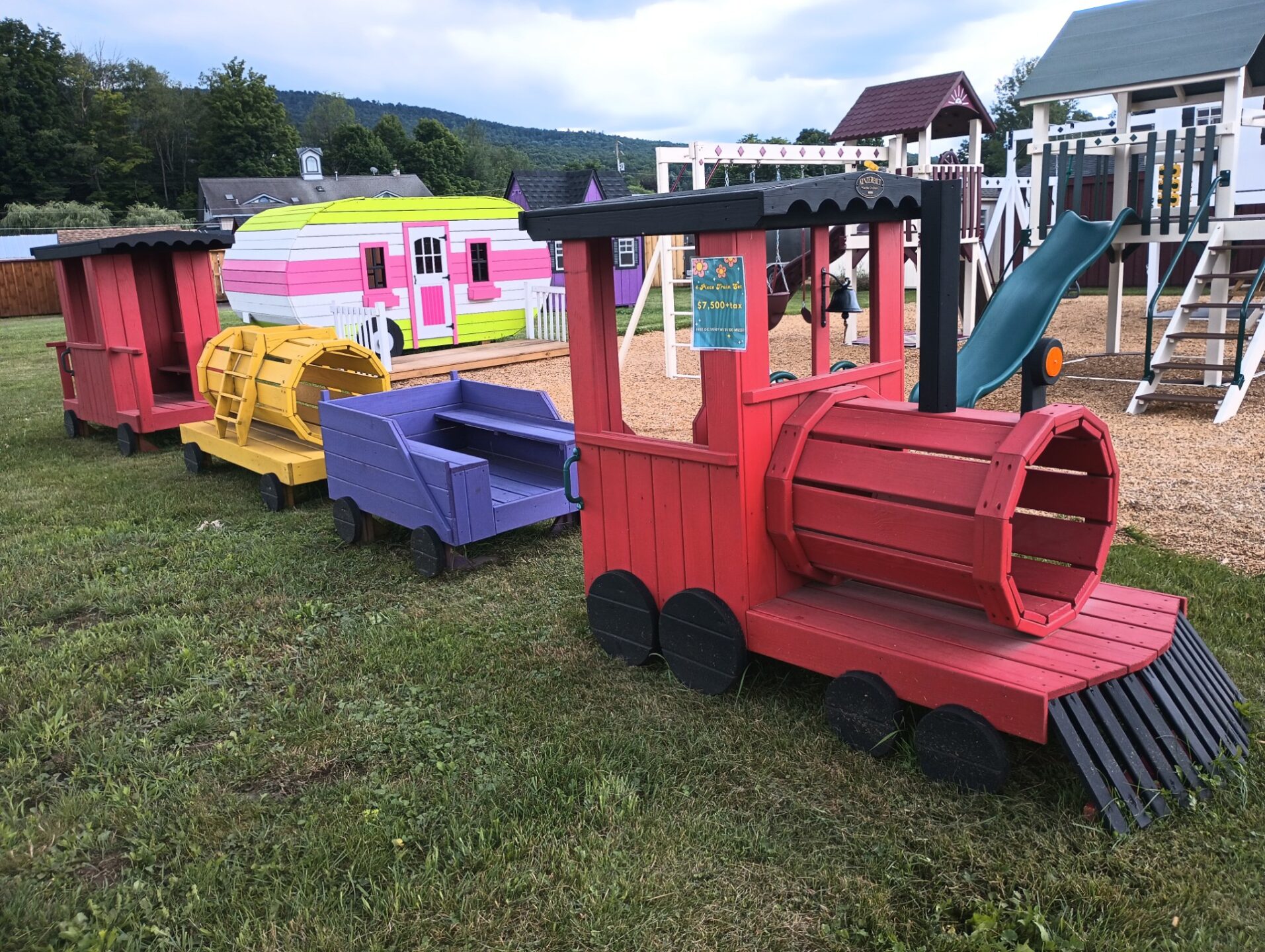 4 Piece colorful wooden train set for children to play on