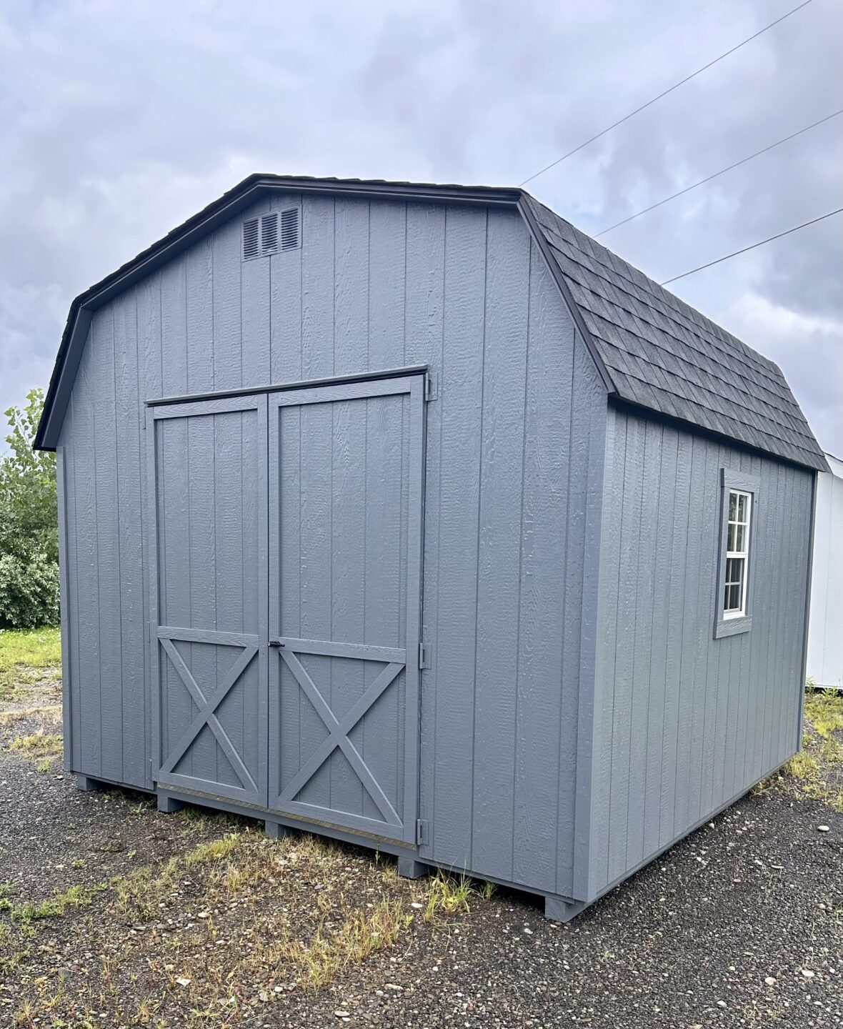 Barn style shed with double doors, 2 windows and shingled roof