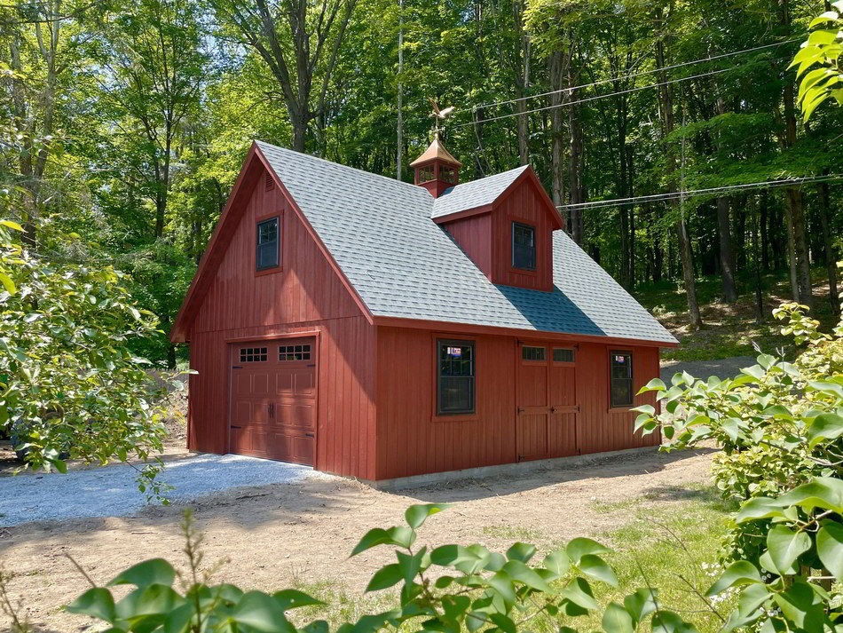 A custom lofted garage by Amish Barn Co