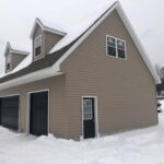 Amish-Built garage surrounded by snow in the middle of winter in Oneonta, NY