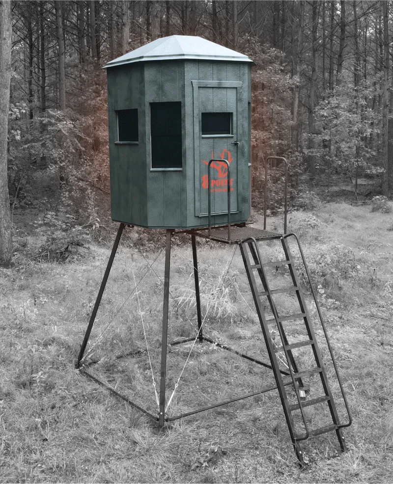 Octagonal hunting blind on metal stand with stairs on front, landing at the top and telescopic adjustable legs